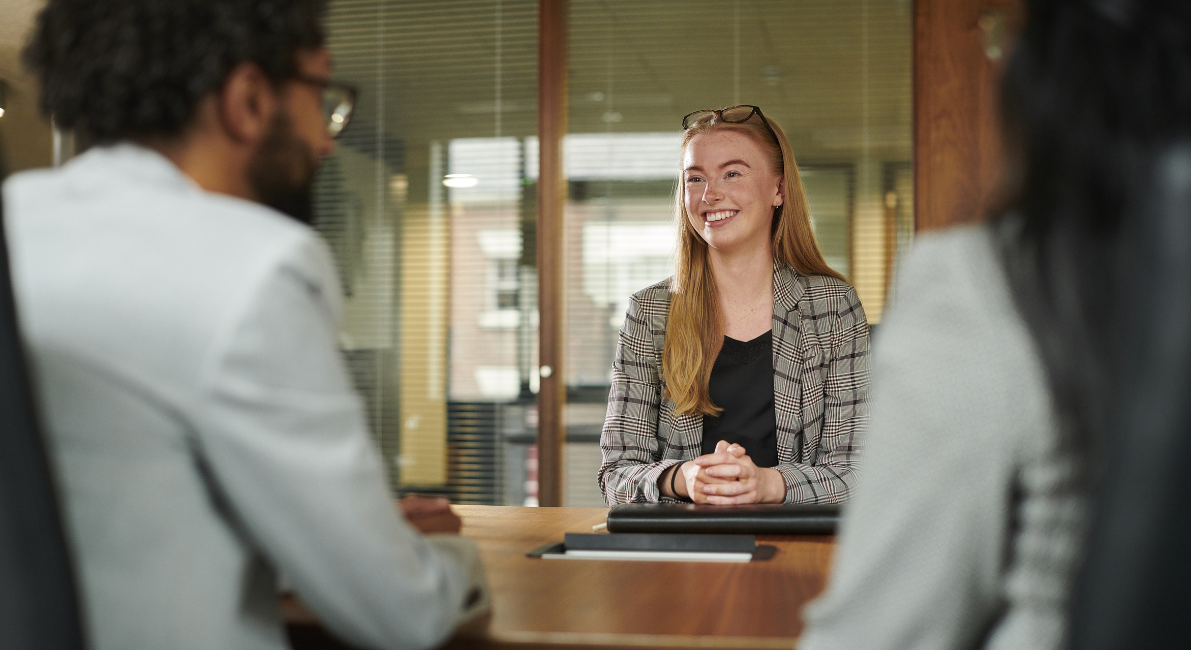 Young woman interviewing for a position at EducationDynamics.