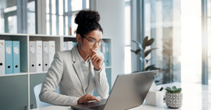 a marketing professional using a computer for GEO analysis